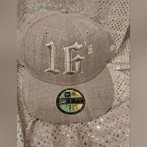 New Era 59FIFTY fitted hat featuring "16" embroidered on the front